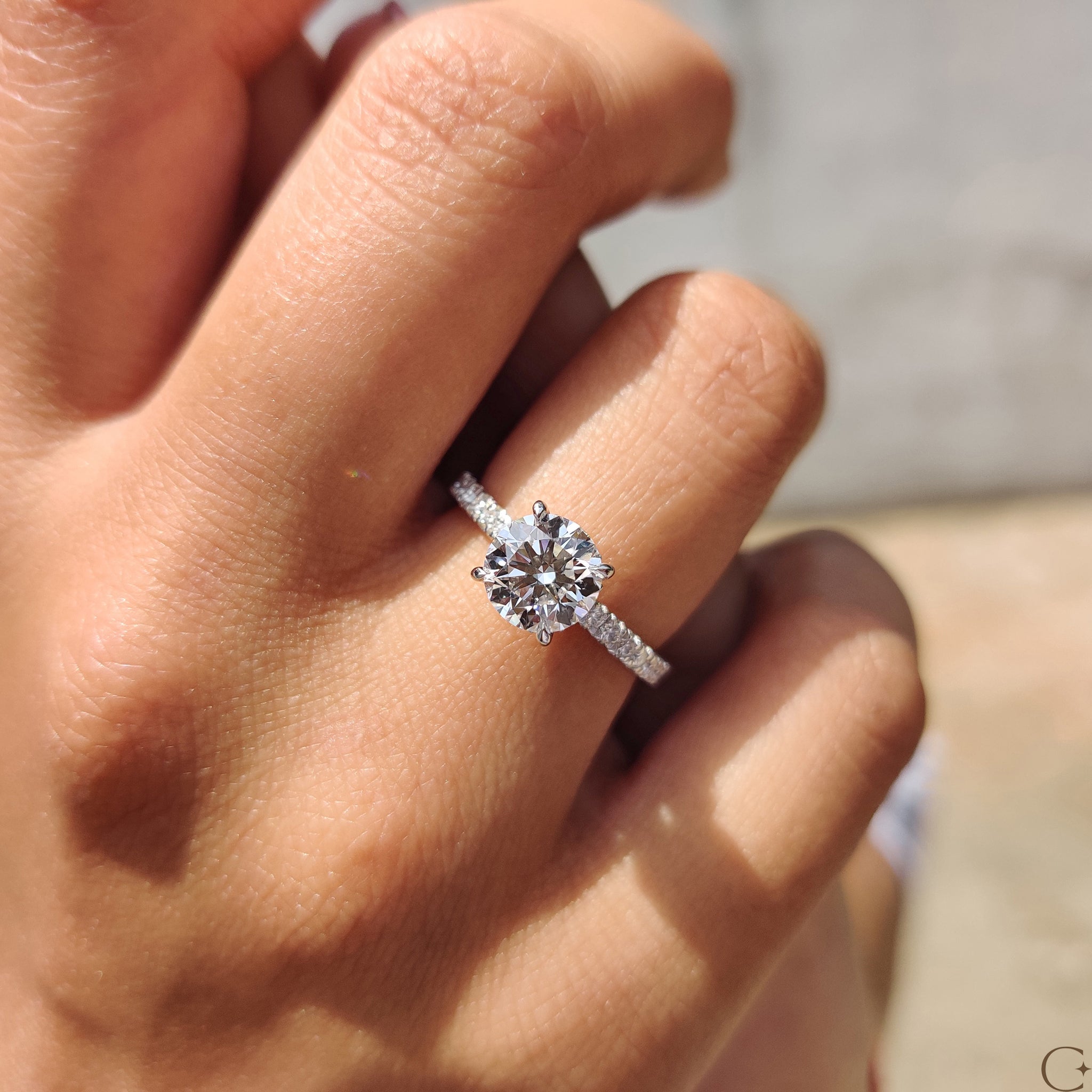 Round Cut Diamond Engagement Ring with Hidden Halo Design