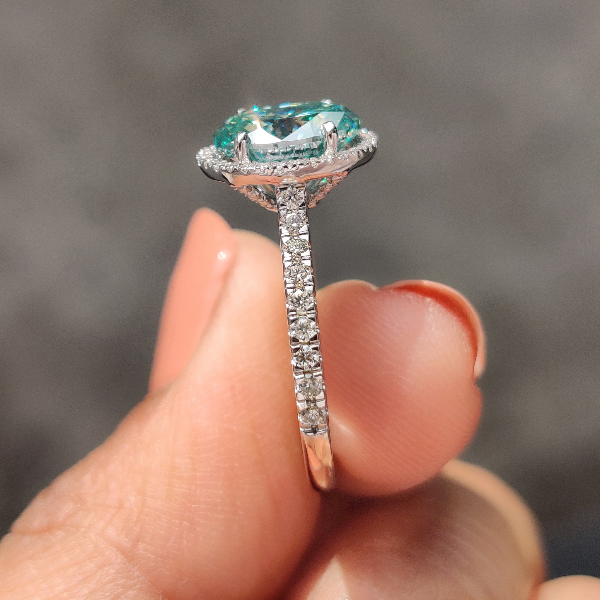 Oval Halo Engagement Ring With Cyan Blue Stone