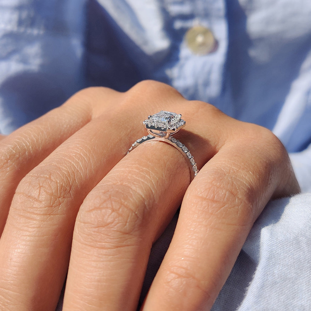Emerald cut halo ring In Round Cut Pave Band