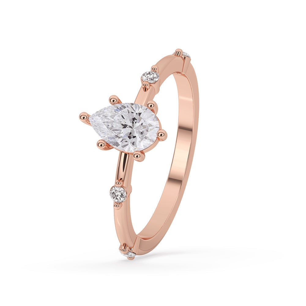 Pear Diamond Ring With Side Round Diamonds