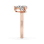 Pear and Baguette Cut Three Stone Engagement Ring
