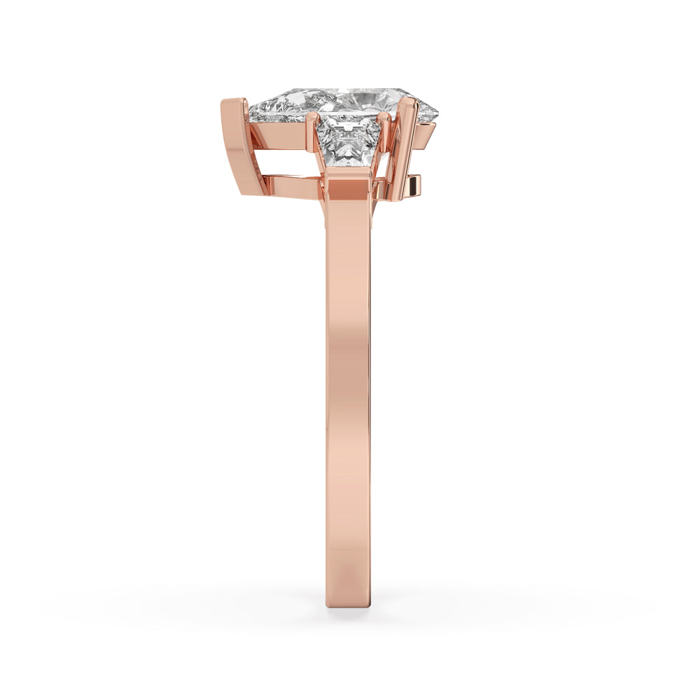 Pear and Baguette Cut Three Stone Engagement Ring