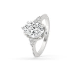 Oval Diamond Ring With Round Side Stone