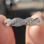 Twisted Eternity Band In Round Cut Moissanite
