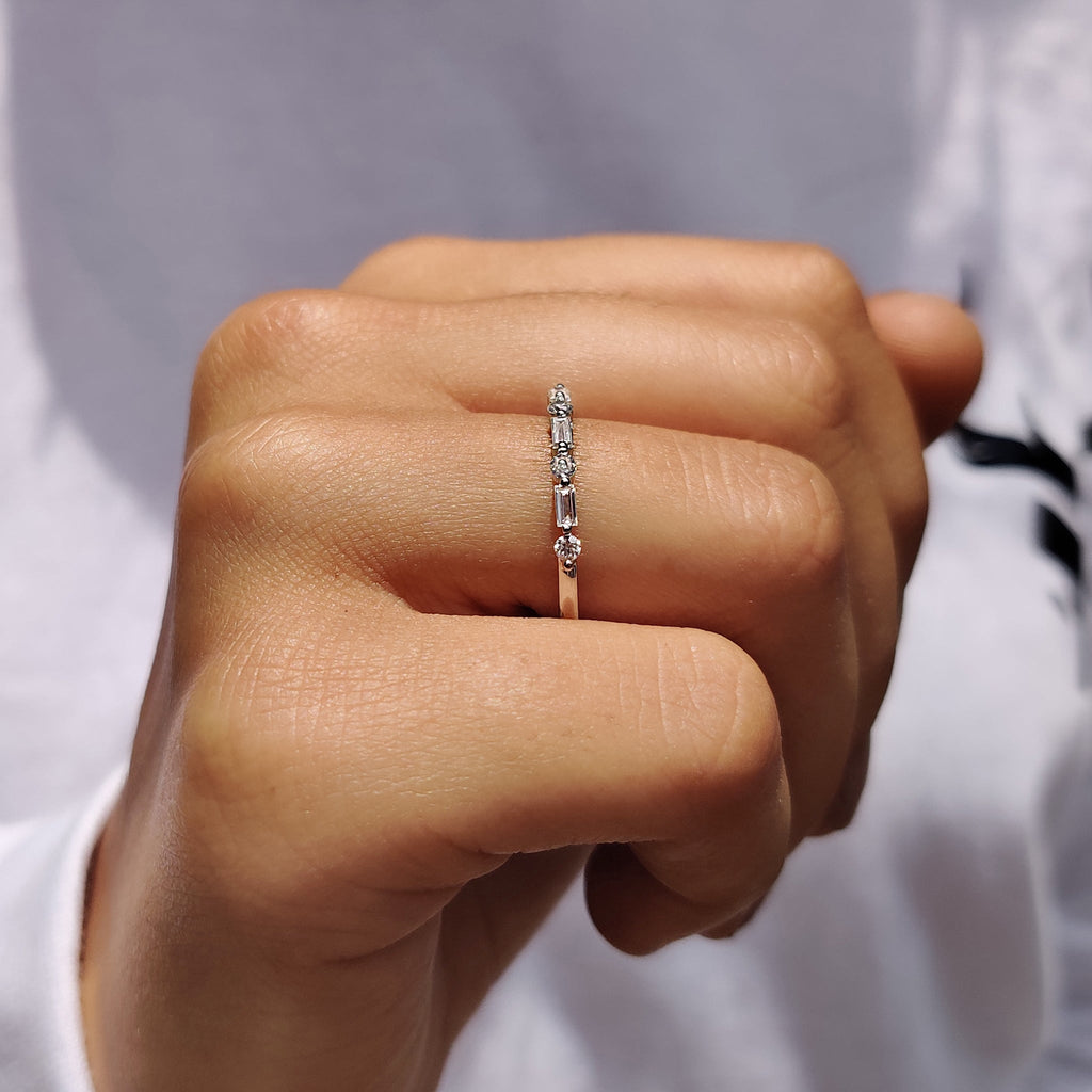 Shared Prong Eternity Band With Round And Baguette Moissanite