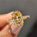 Yellow Oval Moissanite engagement ring in pave set