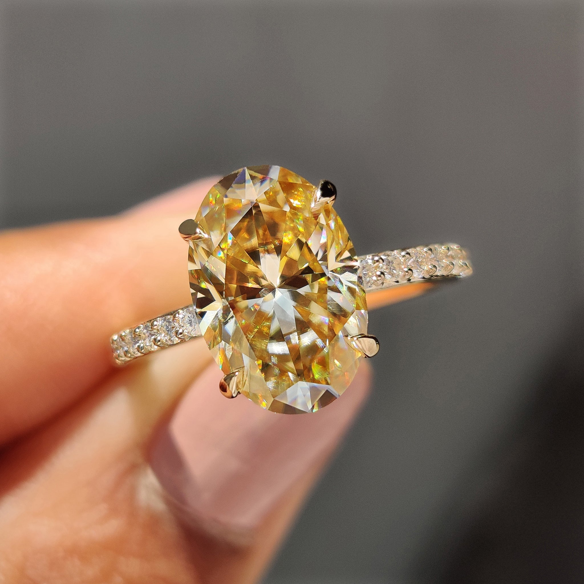 Yellow Oval Moissanite engagement ring in pave set
