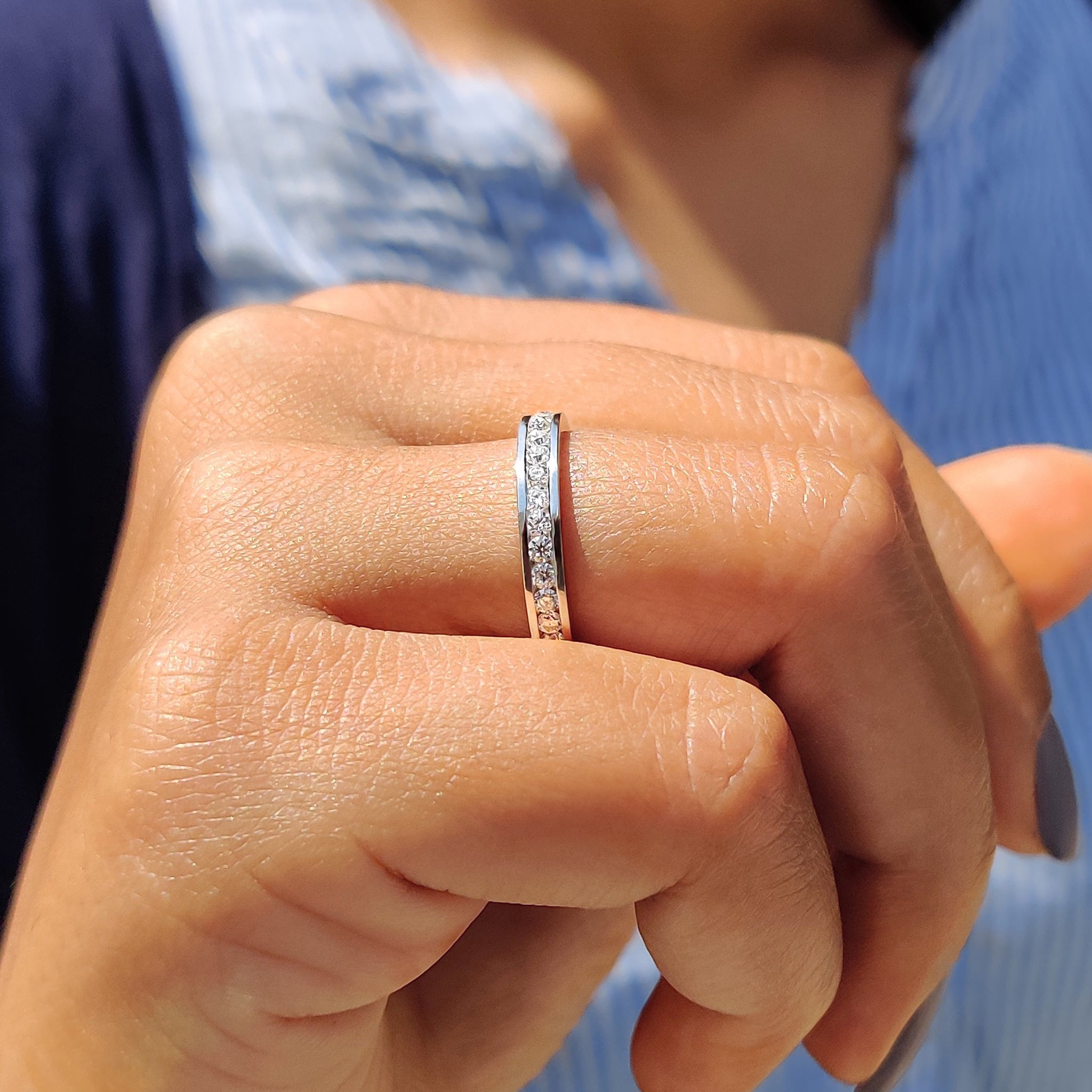 Round Moissanite Channel Set Wedding Band