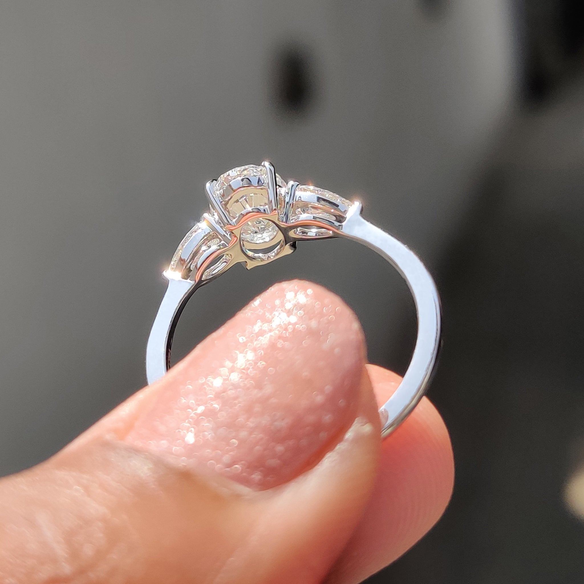 3 Stone Diamond Ring With Oval And Pear Cut