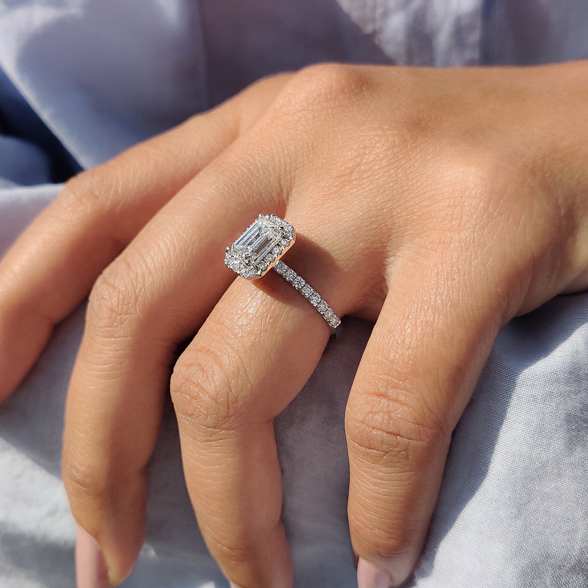 Emerald cut halo ring In Round Cut Pave Band