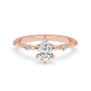 Pear Diamond Ring With Side Round Diamonds