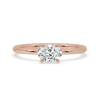 Gold Oval Diamond Engagement Ring With East West Setting