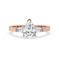 Pear and Baguette Cut Three Stone Engagement Ring