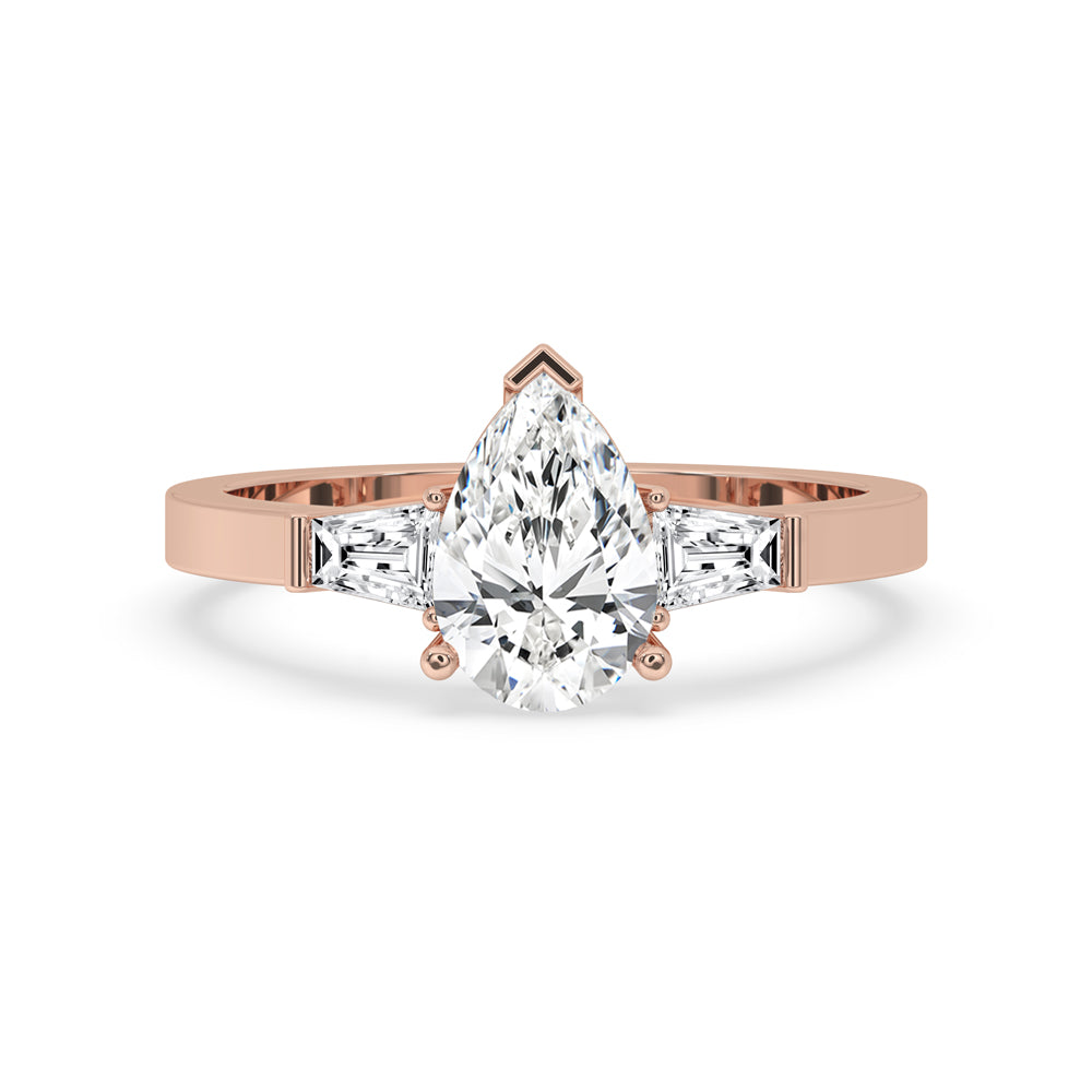 Pear and Baguette Cut Three Stone Engagement Ring