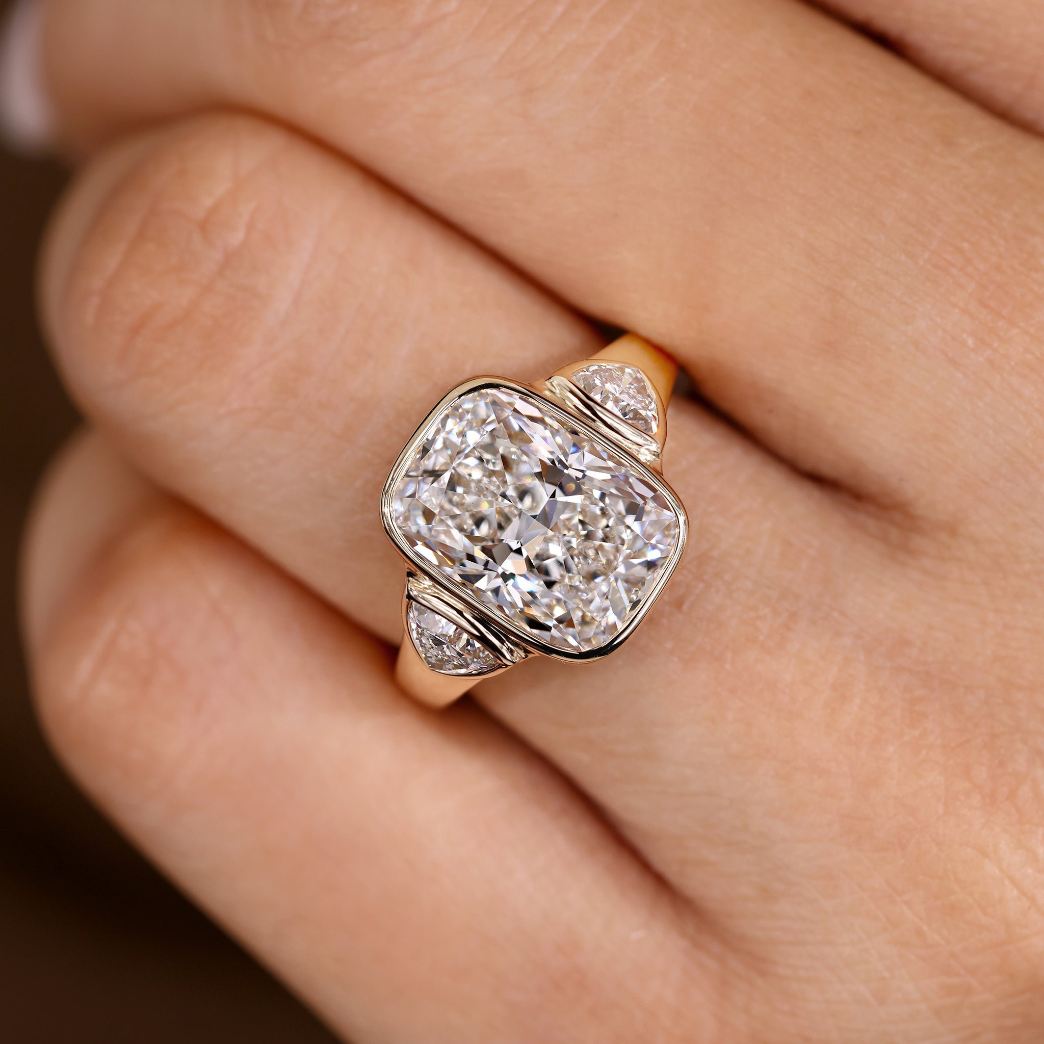 IGI Certified 5-10 Carat Elongated Cushion Cut Ring in bezel setting