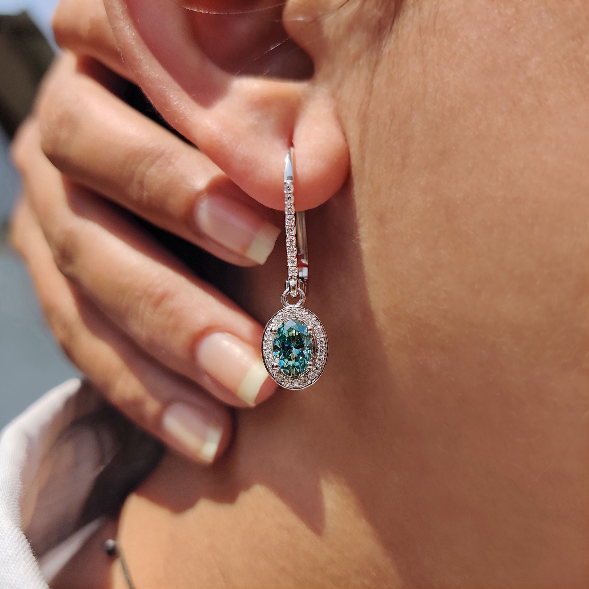 Oval Cut Earrings In Halo Style