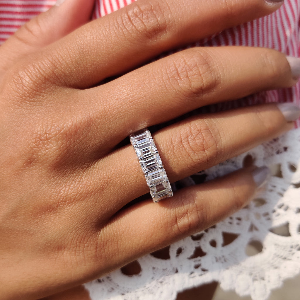 Emerald Wedding Band In A Shared Prong Design