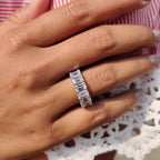 Emerald Wedding Band In A Shared Prong Design