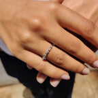 Shared Prong Eternity Band With Round And Baguette Moissanite