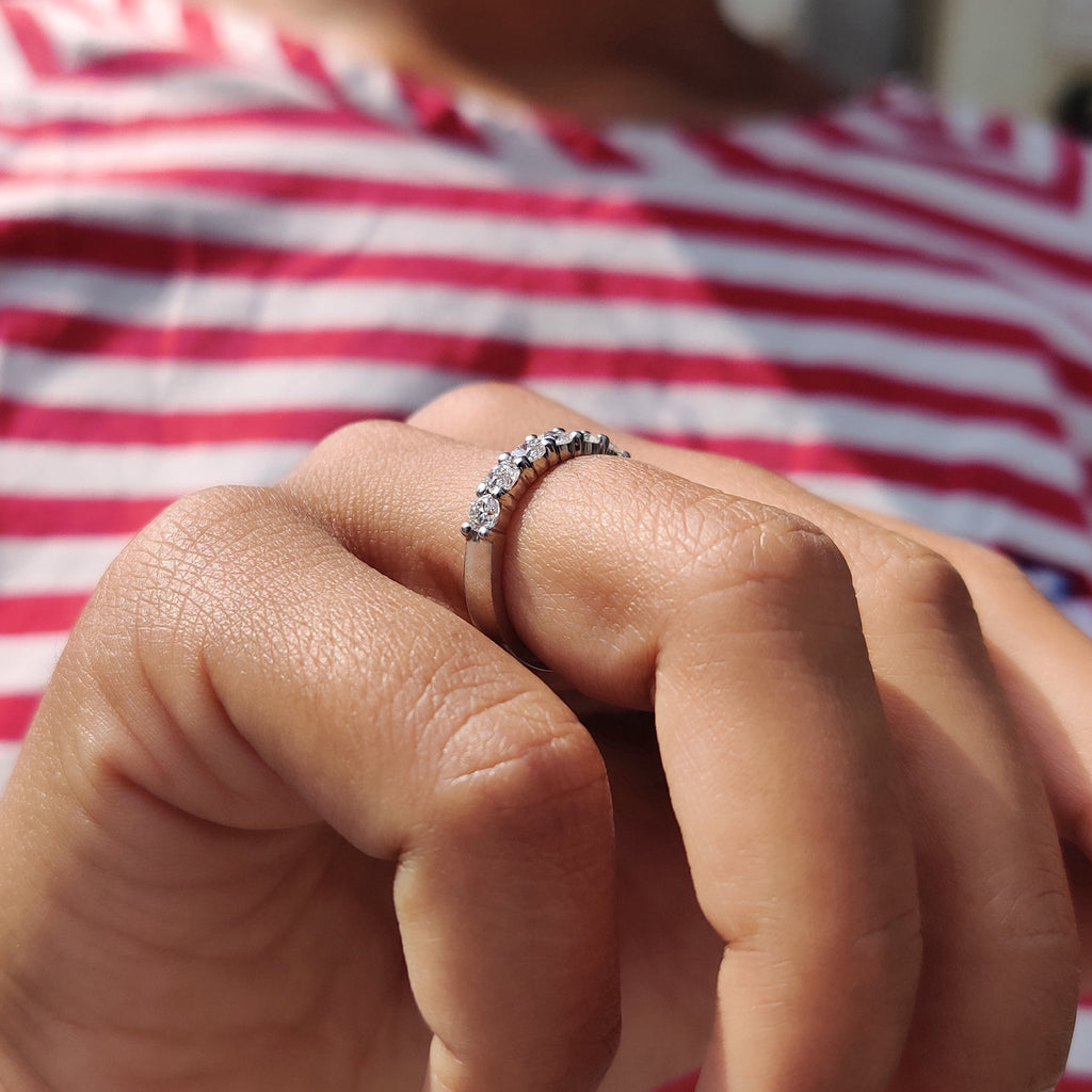 Round Cut White Gold Band With Shared Prong