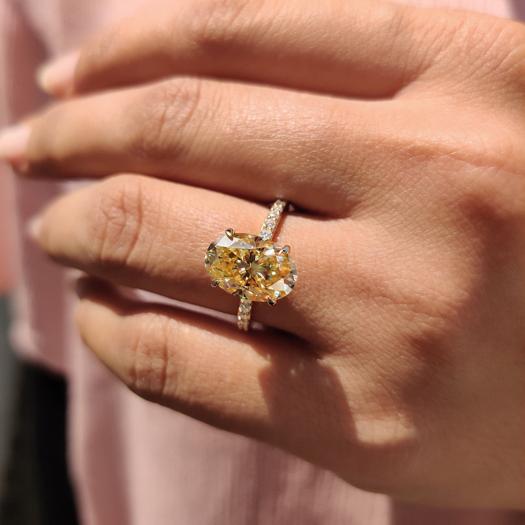 Yellow Oval Moissanite engagement ring in pave set