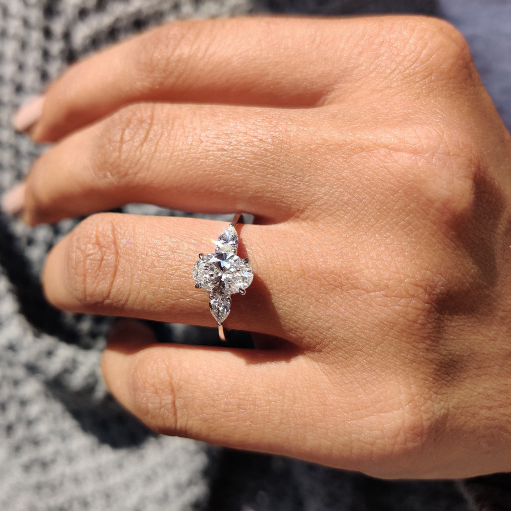 3 Stone Diamond Ring With Oval And Pear Cut