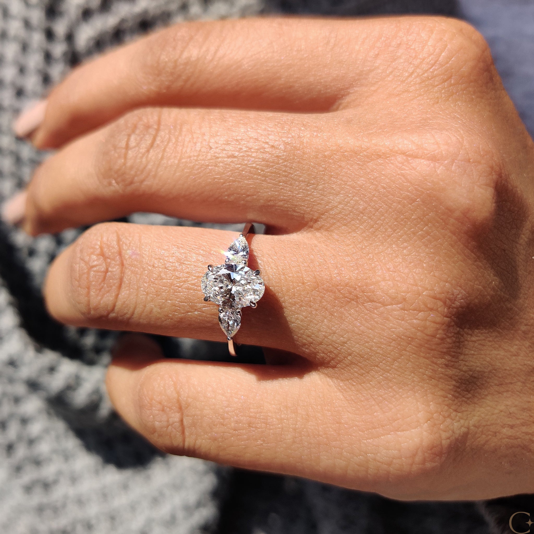 3 Stone Engagement Ring With Oval and Pear Cut Diamond