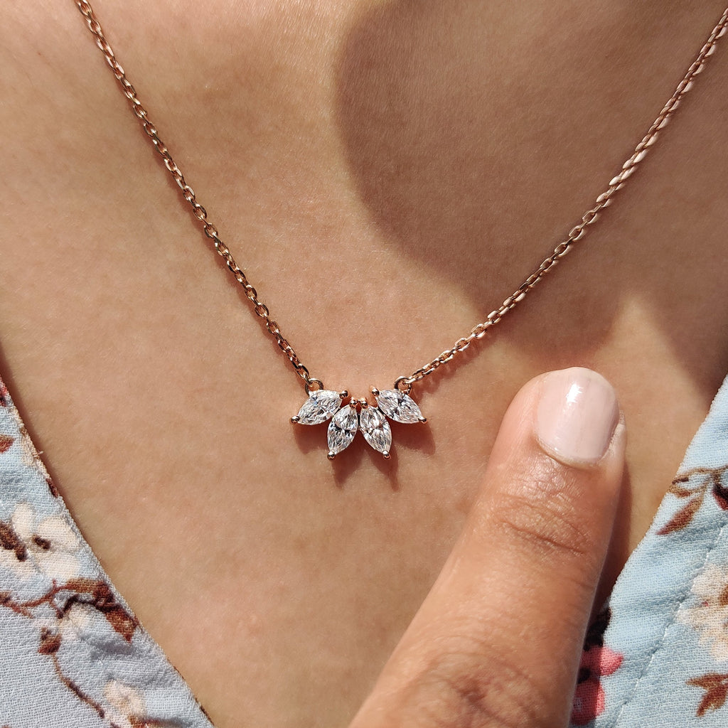 Arc Marquise Moissanite Pendant In Four Stone Design