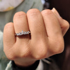 Curved Wedding Band With Marquise And Baguette Stone