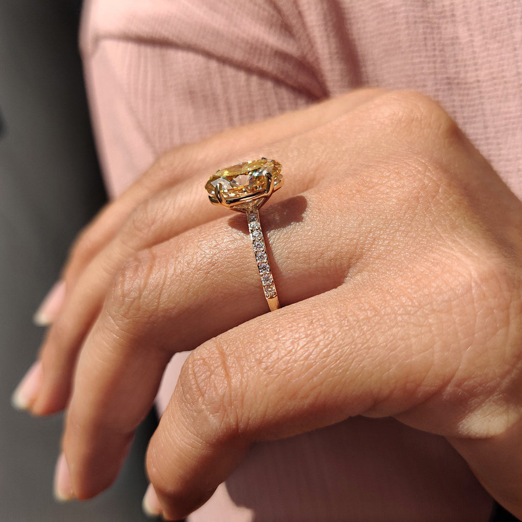 Yellow Oval Moissanite engagement ring in pave set