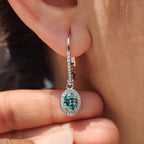 Oval Cut Earrings In Halo Style