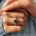 Round And Tapered Baguette Three Stone Engagement Ring