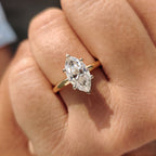 Marquise Cut Solitaire Ring With Hidden Halo Design