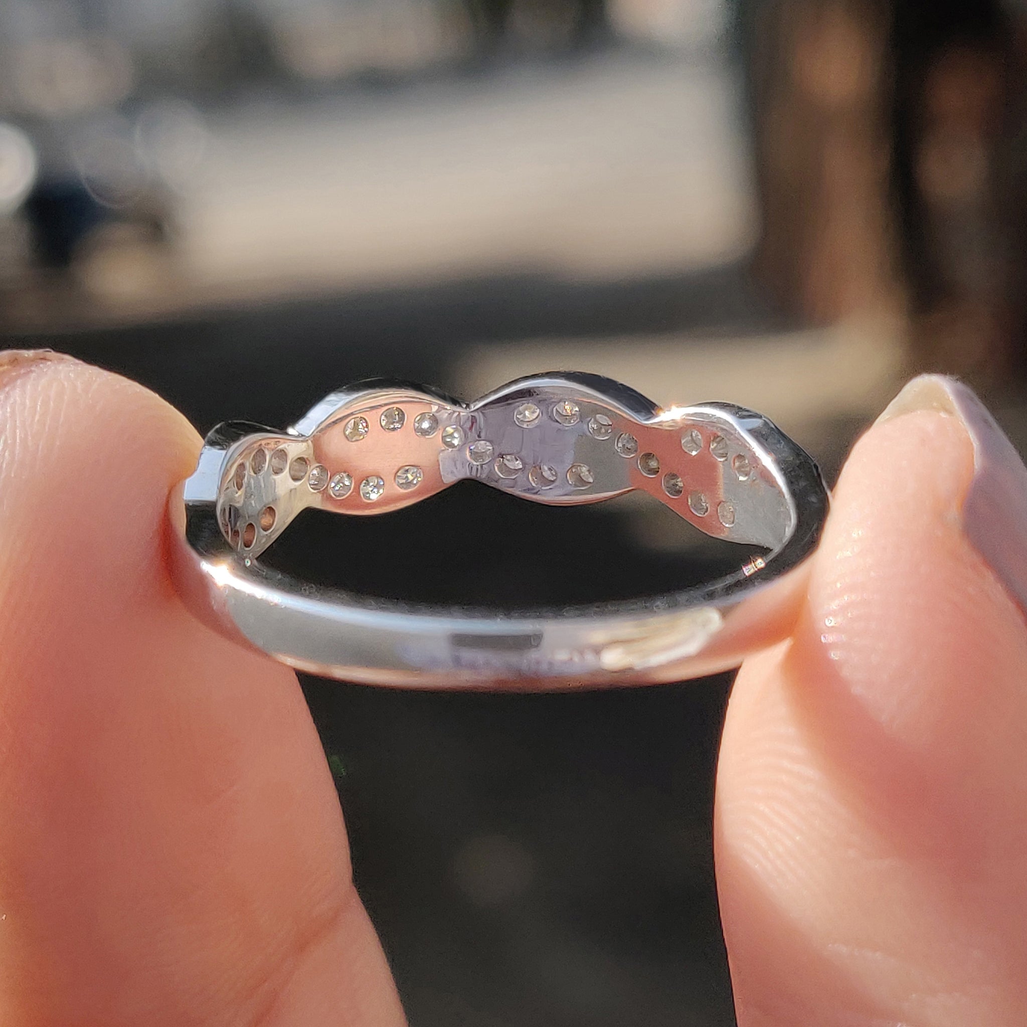 Twisted Eternity Band In Round Cut Moissanite