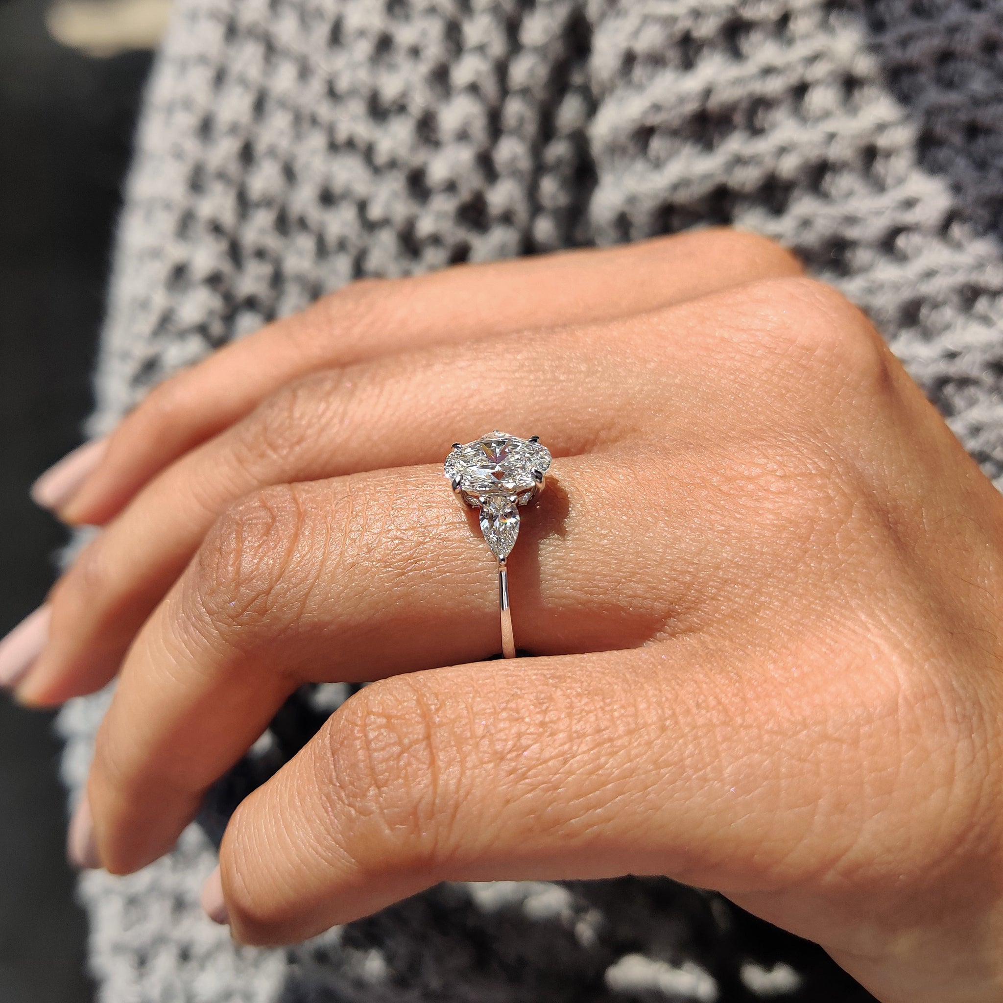 3 Stone Diamond Ring With Oval And Pear Cut
