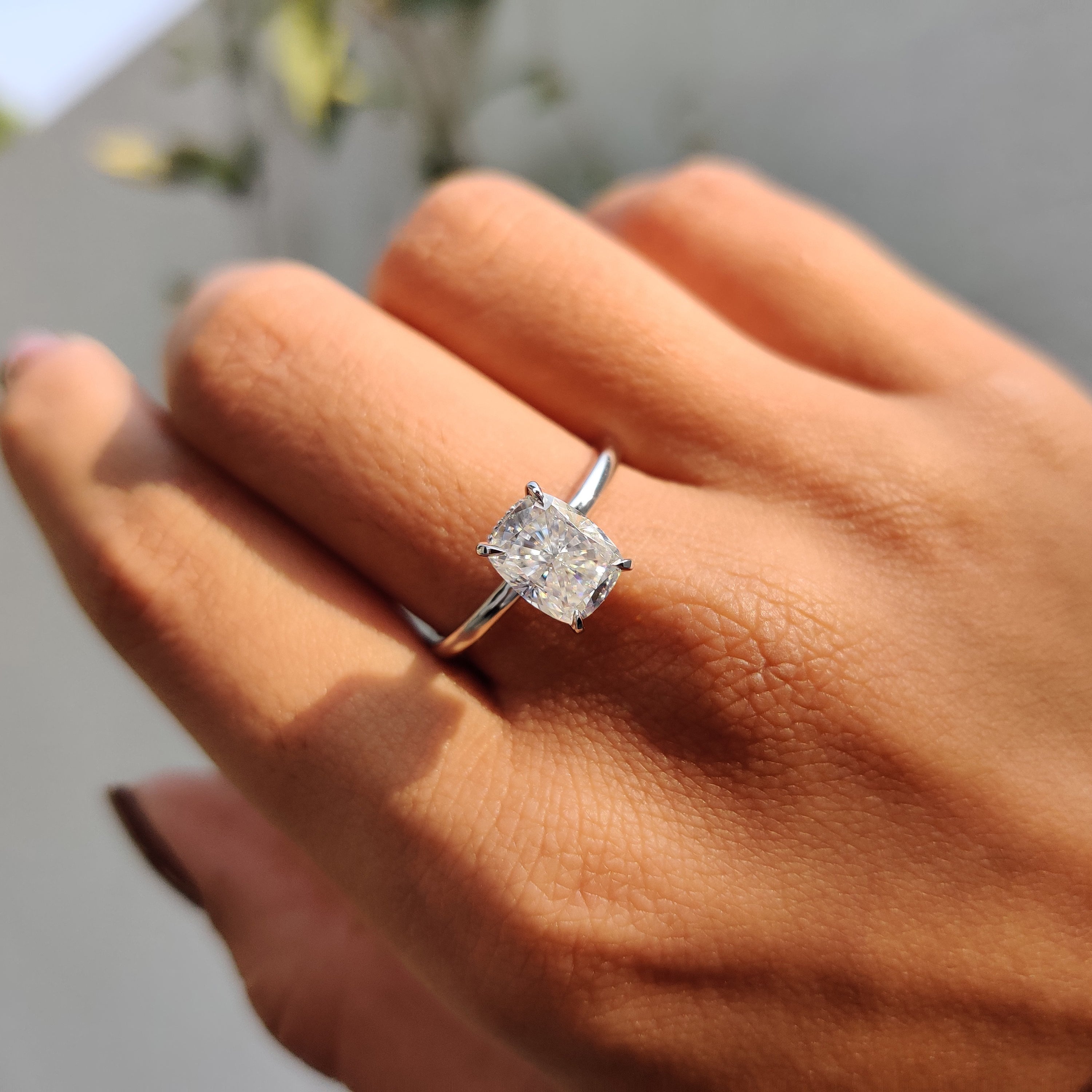 Cushion Cut Engagement Ring With Hidden Halo