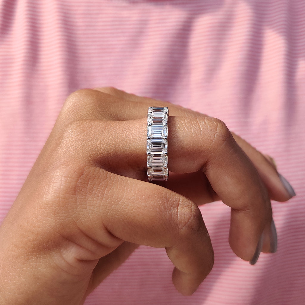 Emerald Wedding Band In A Shared Prong Design