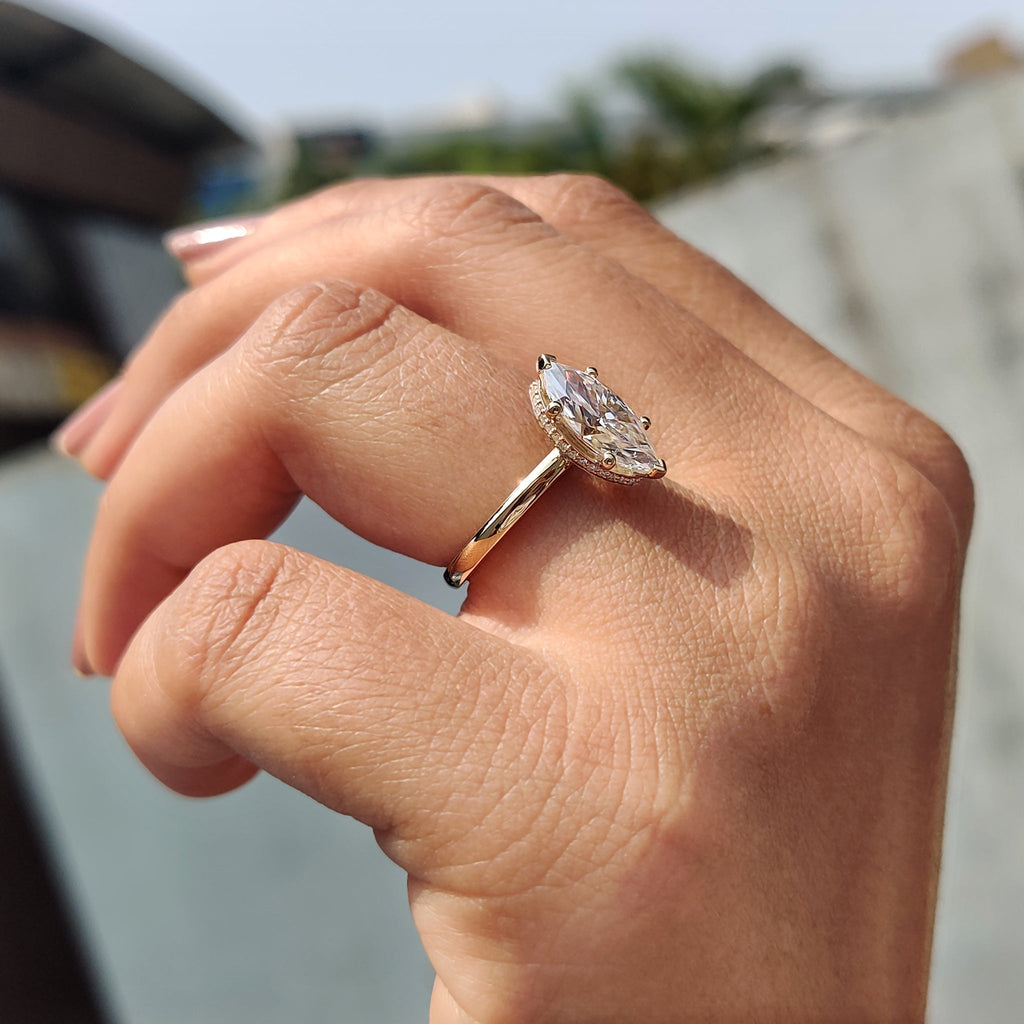 Marquise Cut Solitaire Ring With Hidden Halo Design