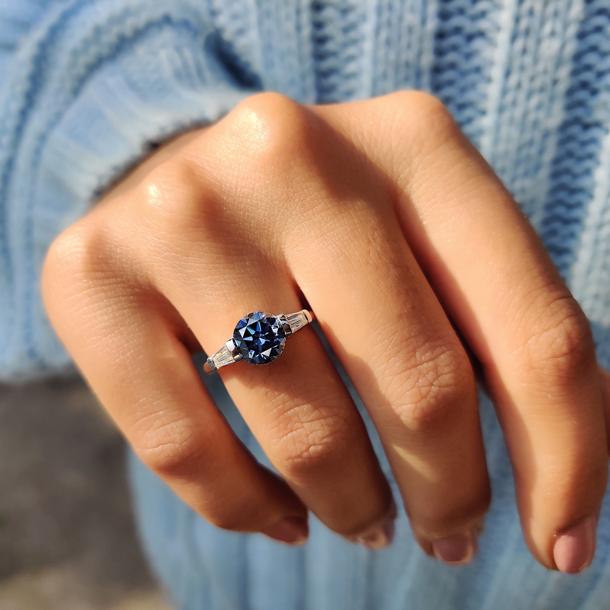 Round And Tapered Baguette Three Stone Engagement Ring