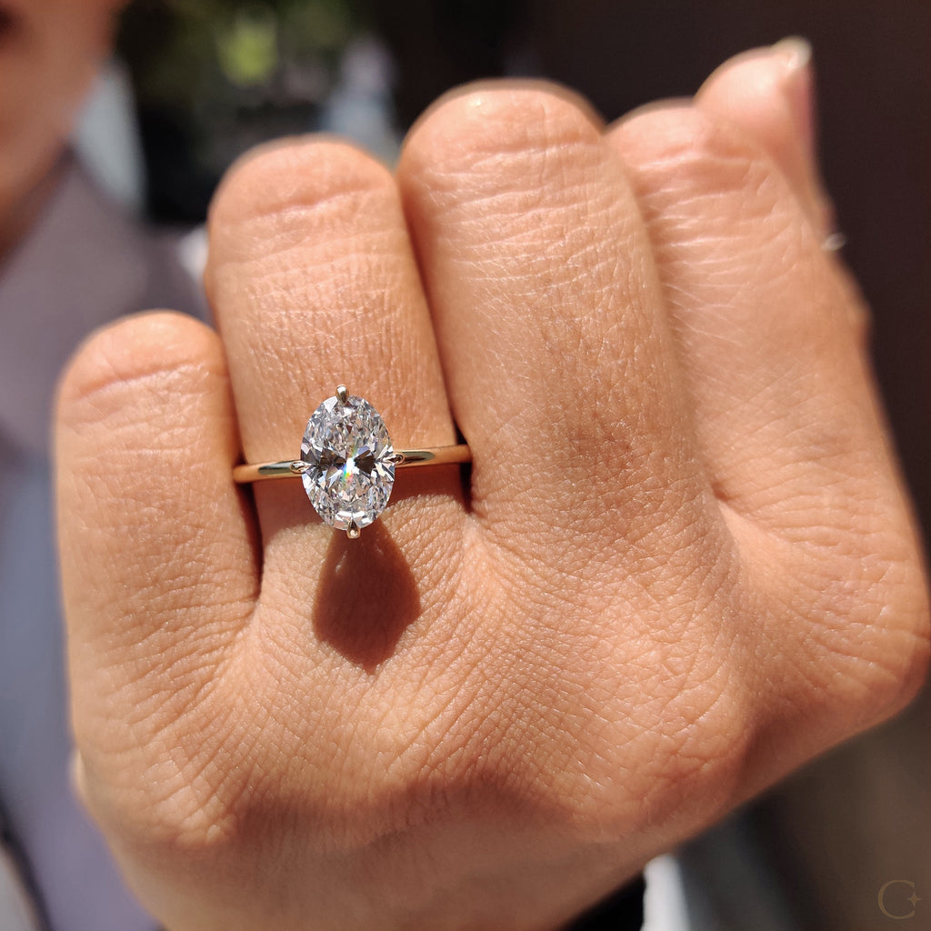 Oval Solitaire Diamond Ring With Compass Prong