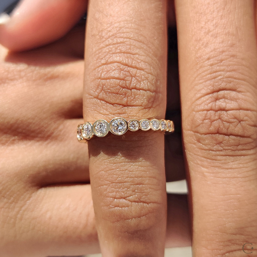 Bezel Set Wedding Band Featuring Round Diamond