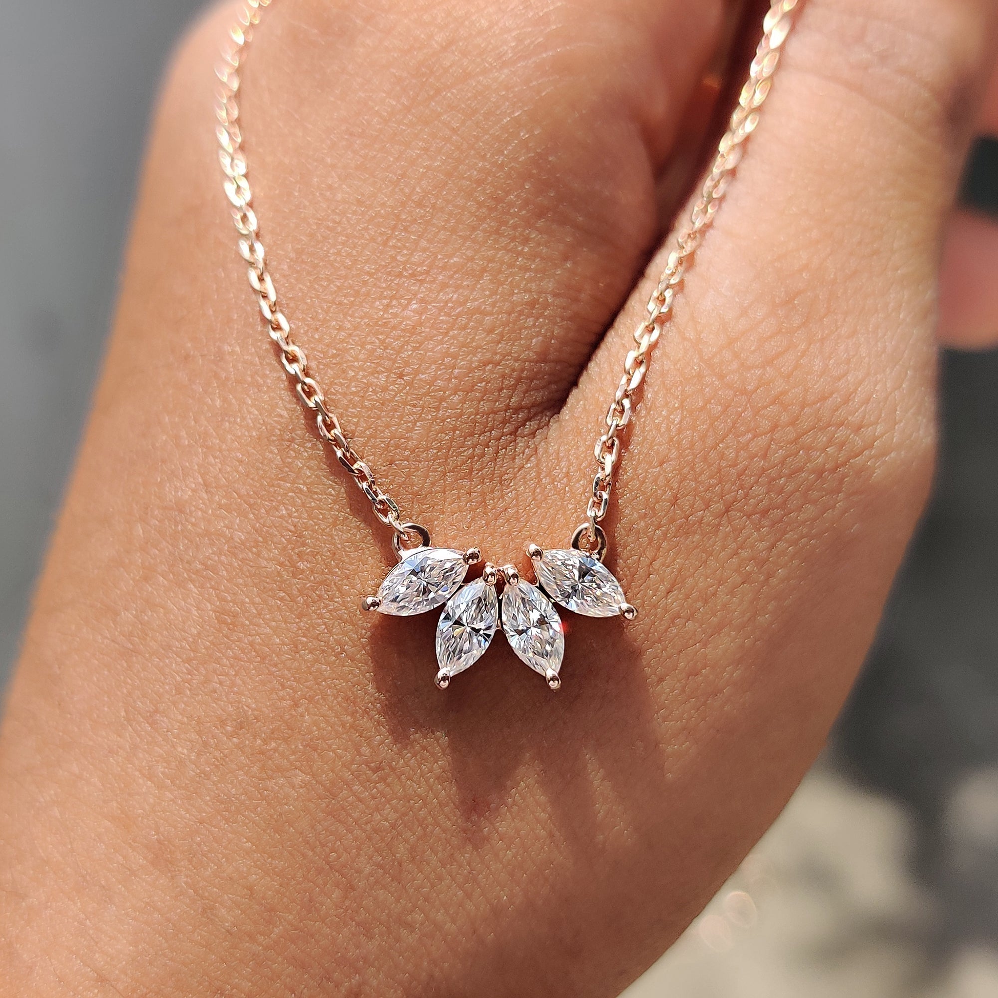 Arc Marquise Moissanite Pendant In Four Stone Design