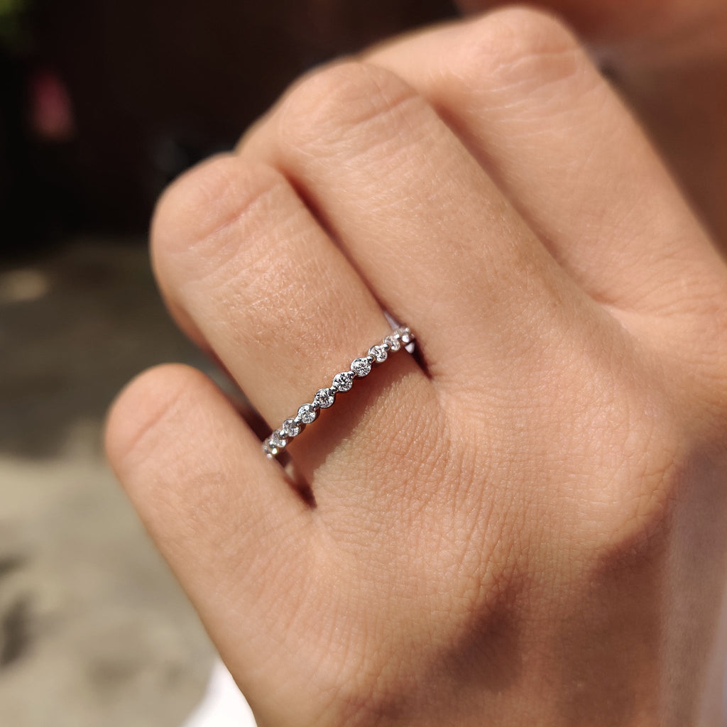 Round Cut Moissanite Shared Prong Wedding Band