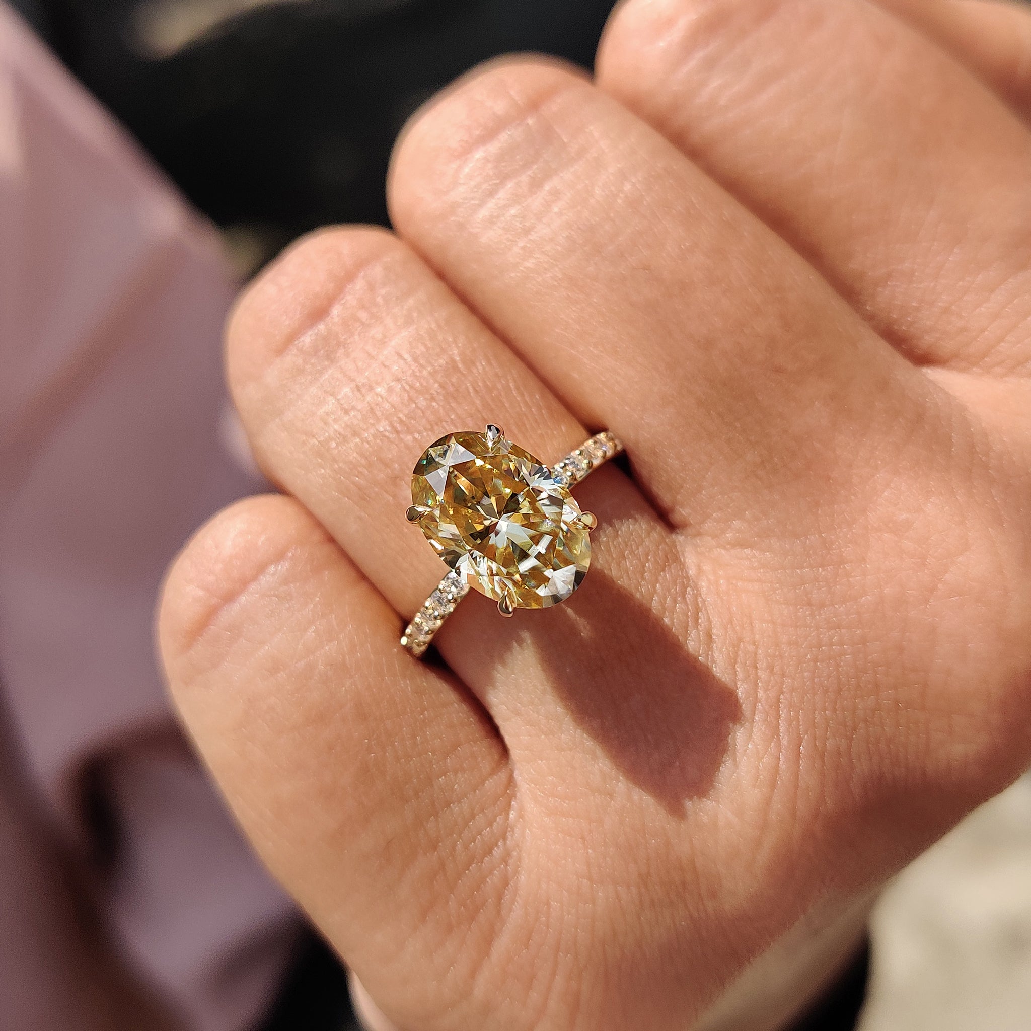 Yellow Oval Moissanite engagement ring in pave set