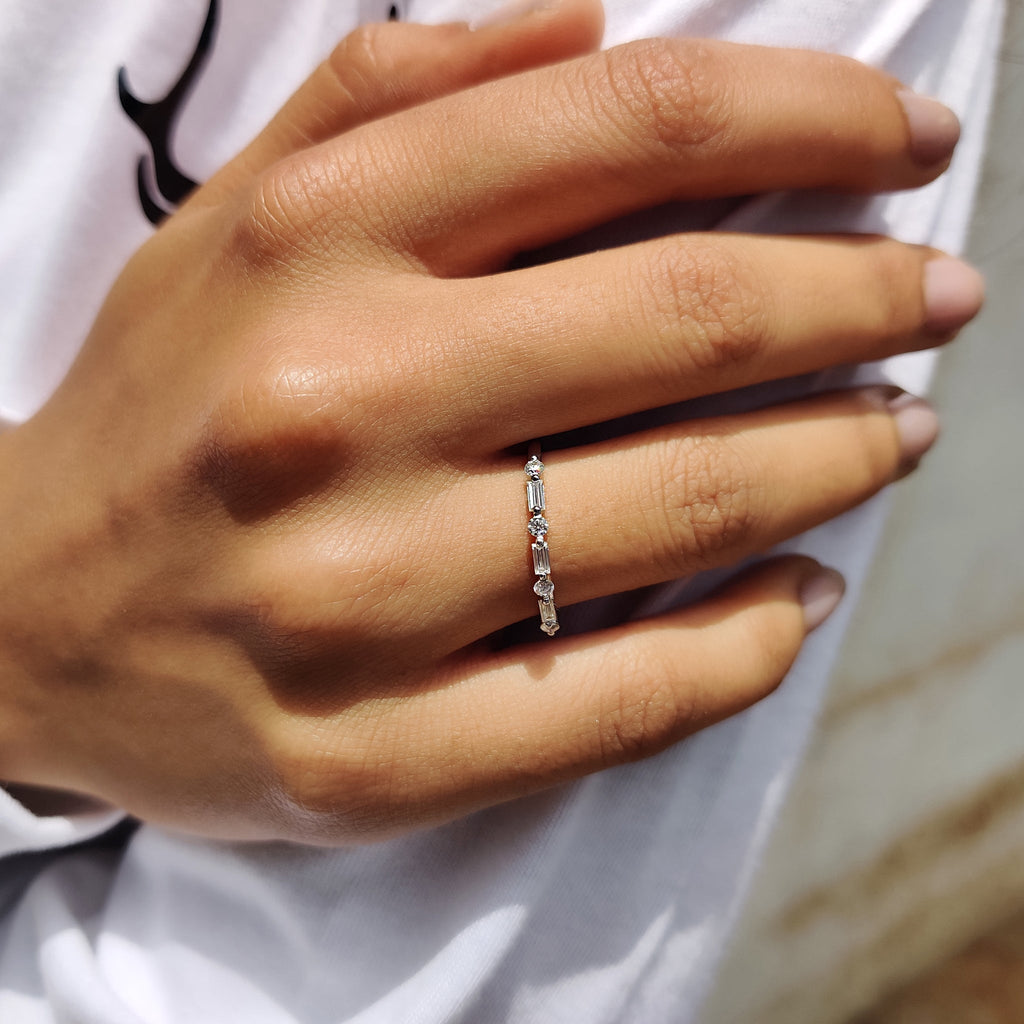 Shared Prong Eternity Band With Round And Baguette Moissanite