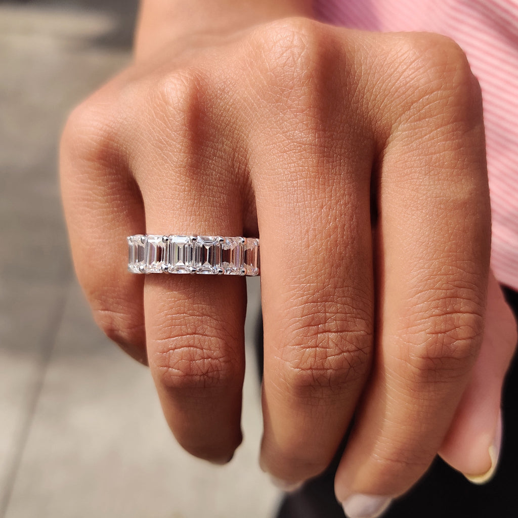 Emerald Wedding Band In A Shared Prong Design