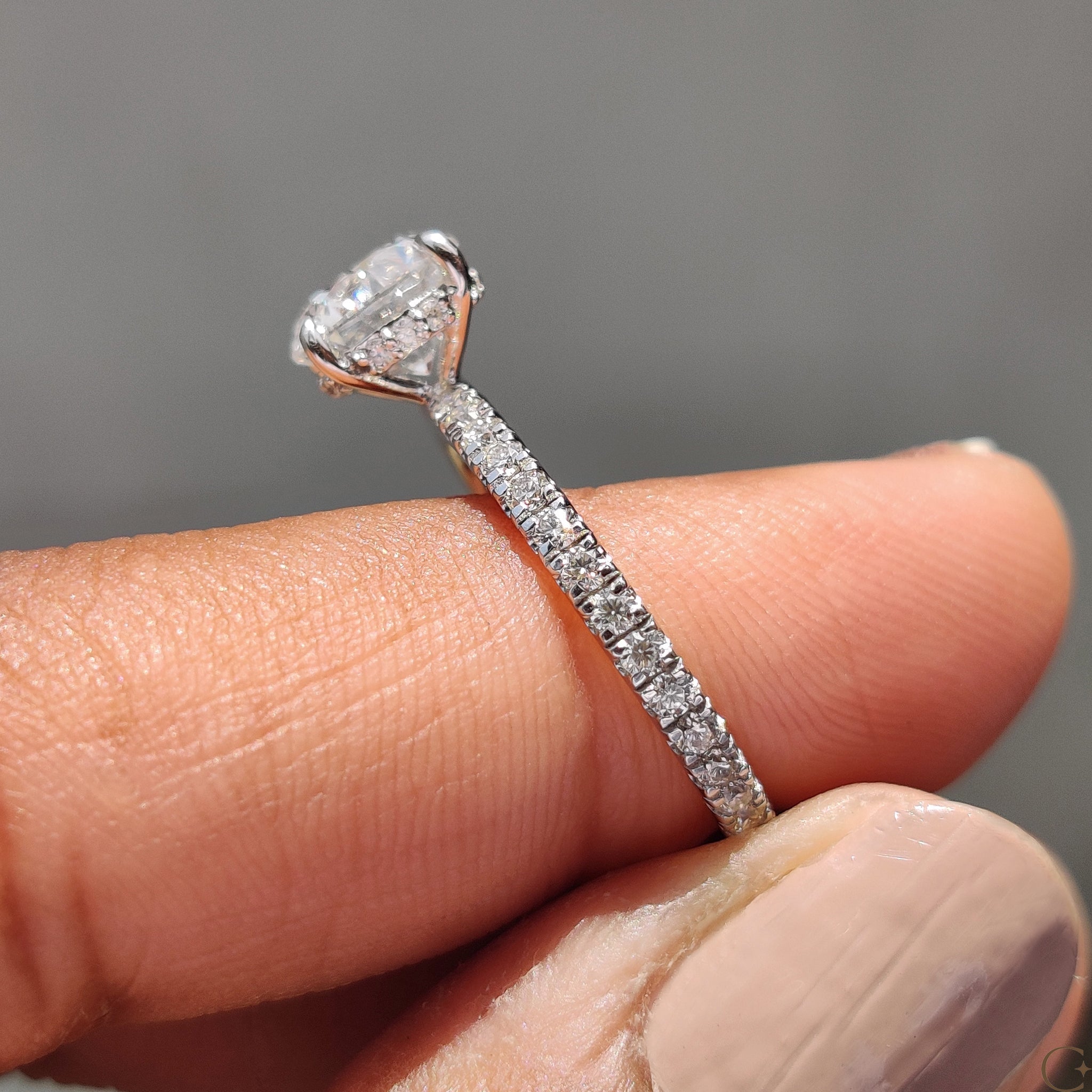 Round Cut Diamond Engagement Ring with Hidden Halo Design