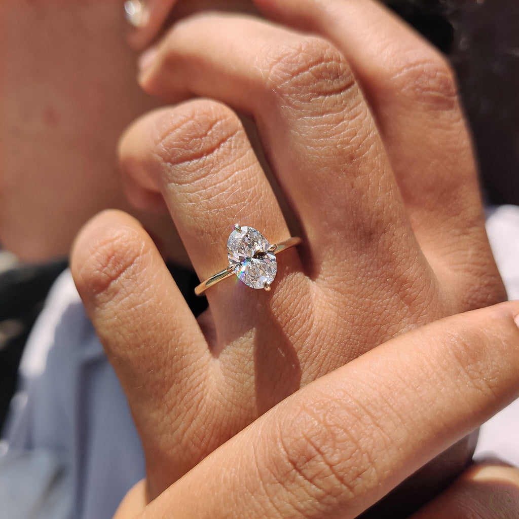 Oval Solitaire Diamond Ring With Compass Prong