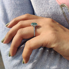 Oval Halo Engagement Ring With Cyan Blue Stone