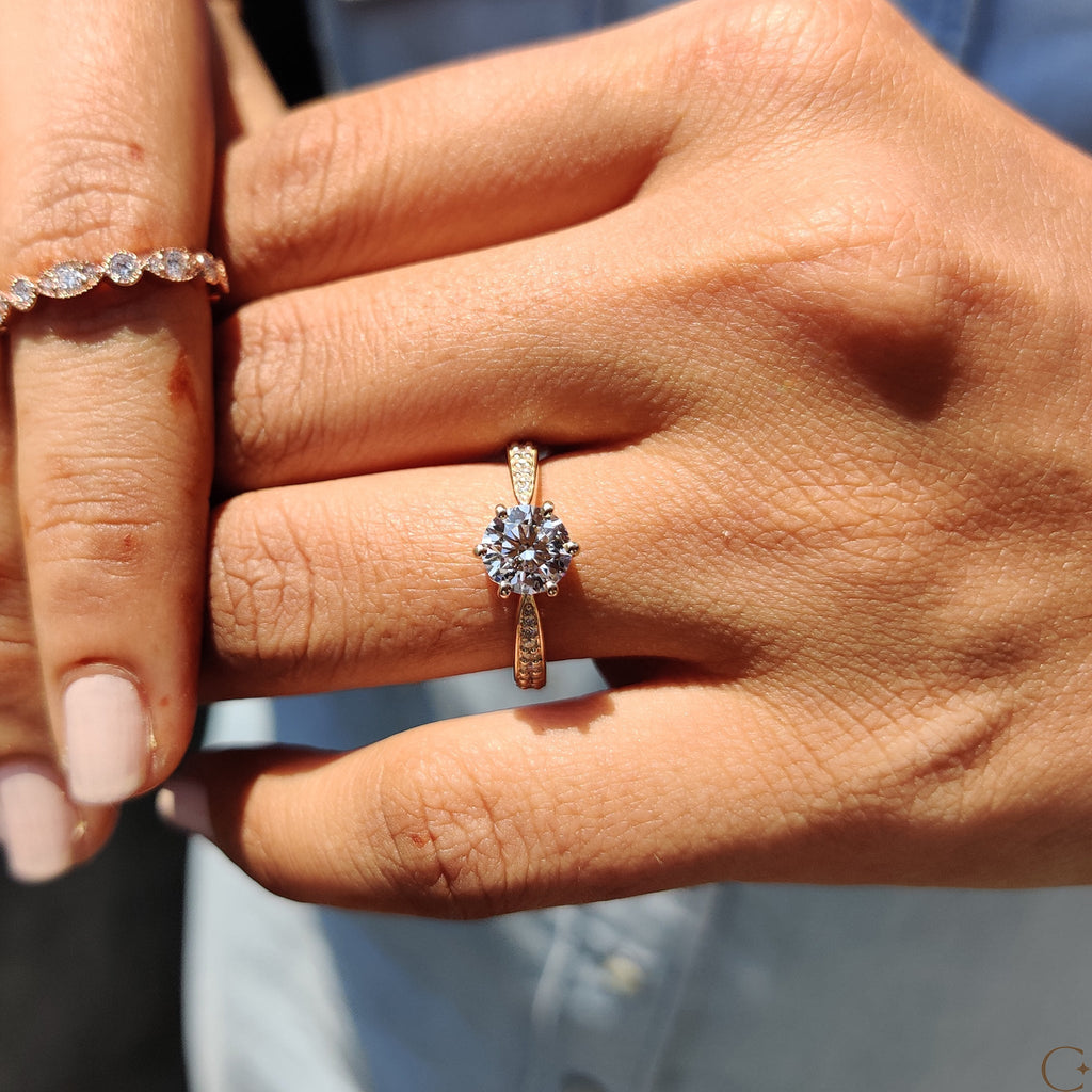 Round Cut Engagement Ring with Tapered Pave Setting